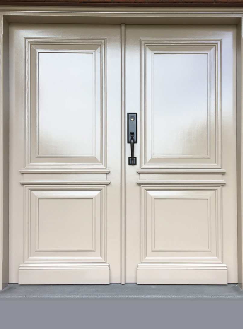 Modern entrance doors with sleek design and metal handles